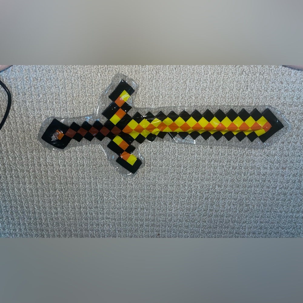 Pixelated Toy Sword with Bold Colors